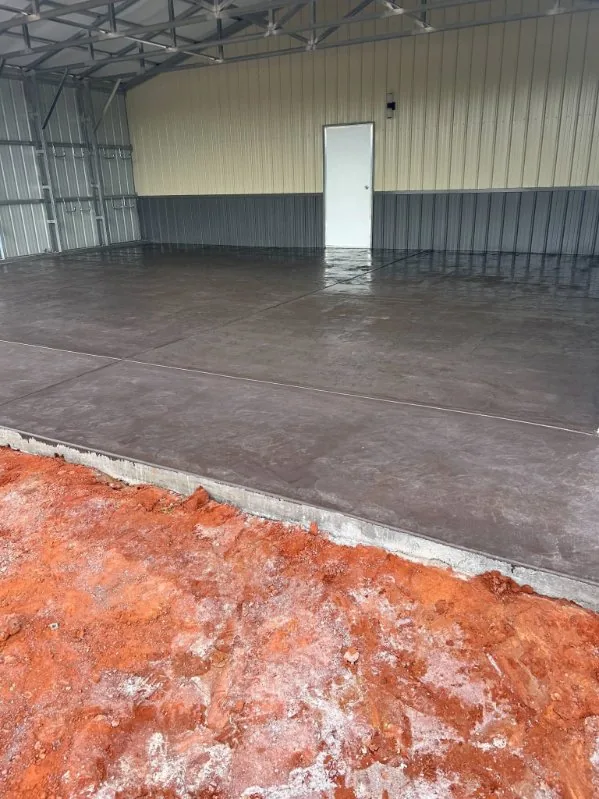 Finished concrete shop floor inside a metal building
