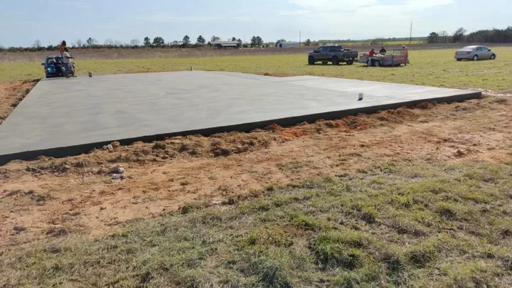 Large concrete slab poured in an open field